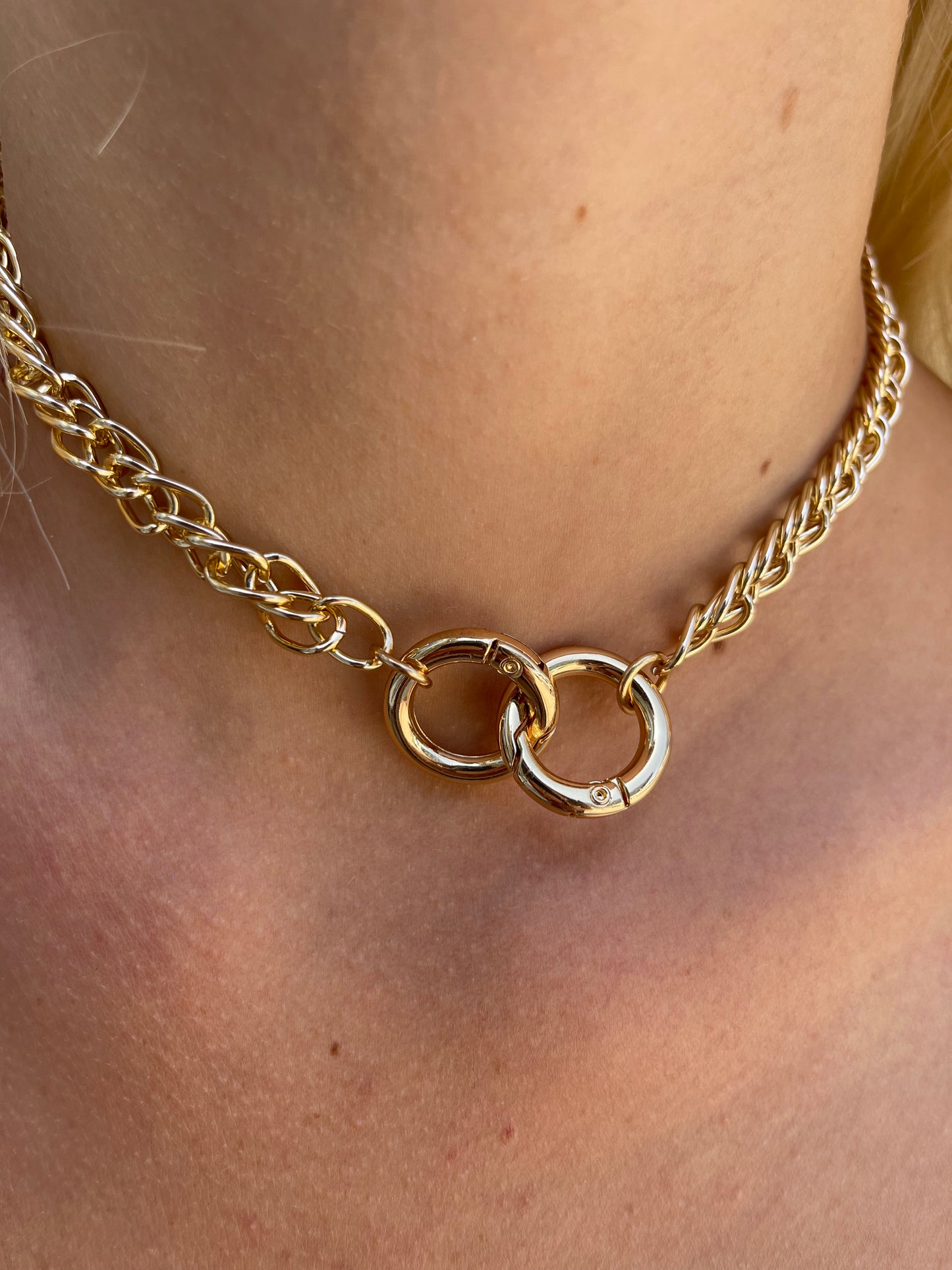 Gold necklace with double ring